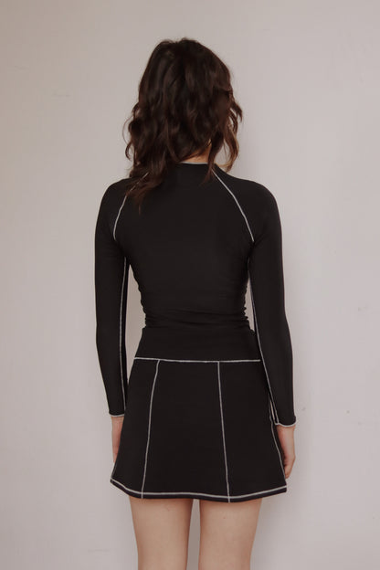 Alfil Top- Buzo rib negro con costuras crema